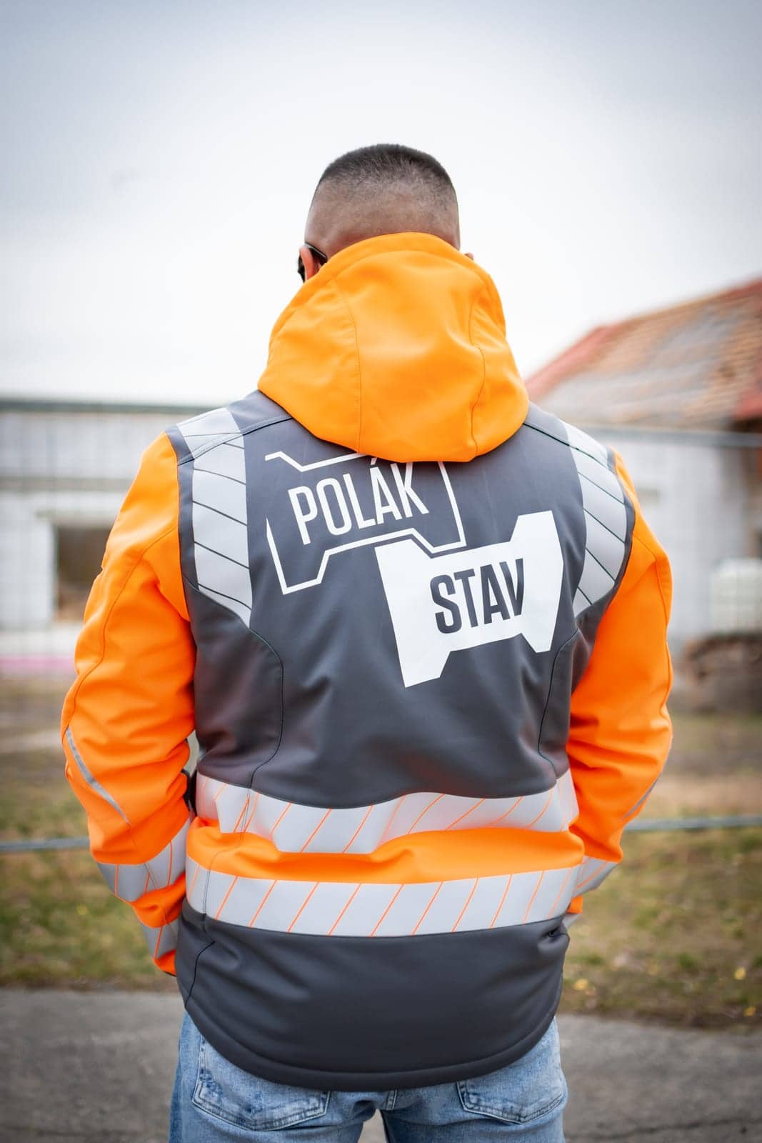 Pracovná bunda s reflexnými pruhmi a logom POLÁKSTAV na chrbte